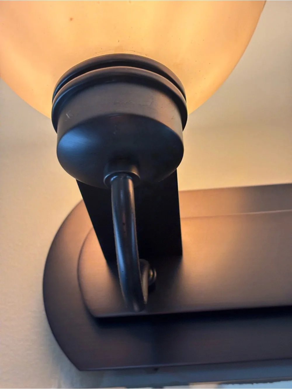 2-Light Bathroom Vanity Wall Light Rubbed Bronze with Beige Glass Shades. (3)